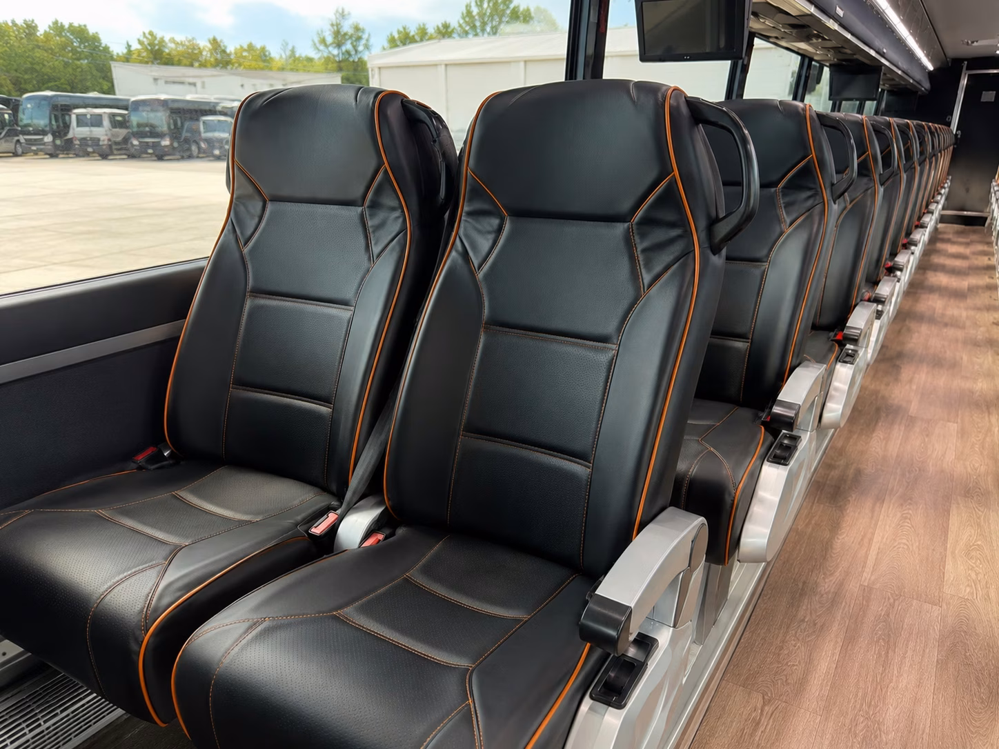 how the type of bus you rent in north port florida changes what you pay